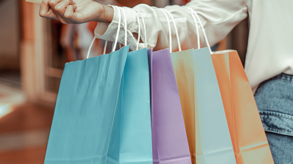 A person holding shopping bags