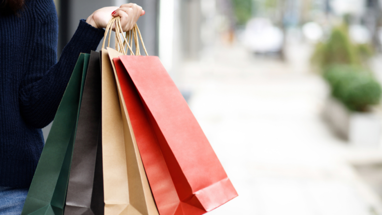 A person holding shopping bags