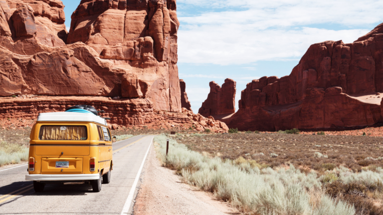 image of a car in the middle of the road