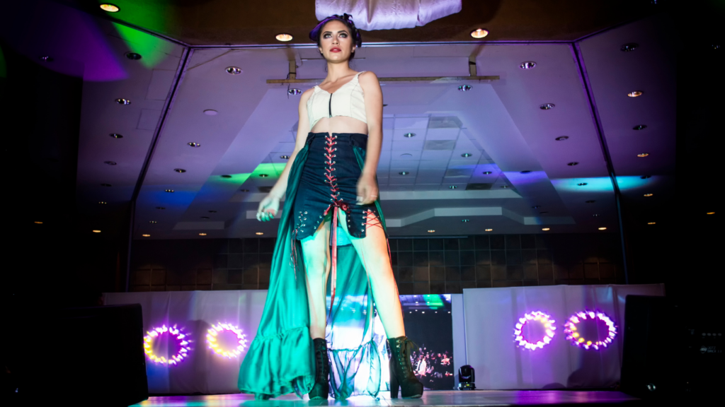 a model walks down the runway at a fashion show